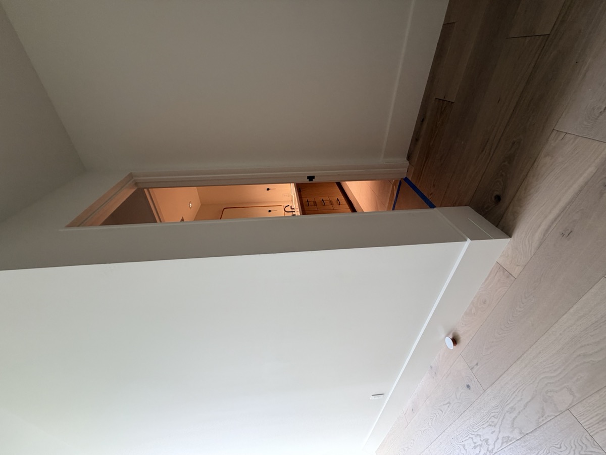 Integrated baseboard and door jamb detail by Mastercraft Interiors